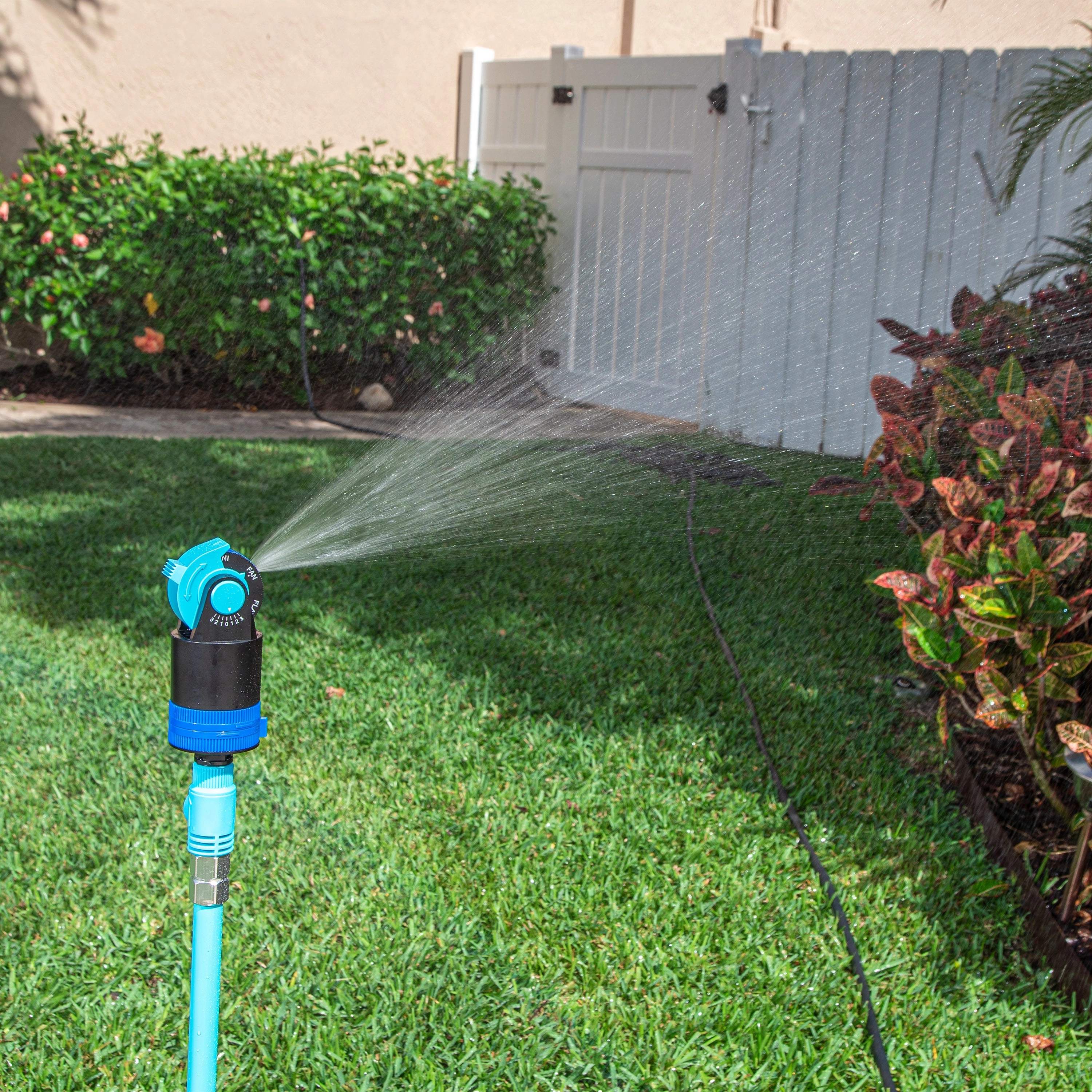 Aqua Joe Indestructible Watering Bundle | Includes Heavy Duty Stainless Steel Hose. Indestructible Multi-Function Nozzle. and Indestructible Tripod Sprinkler